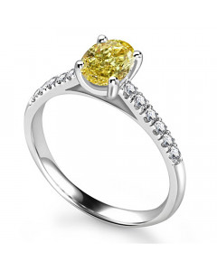 0.90ct SI2/ Oval Yellow Diamond Ring in Platinum
